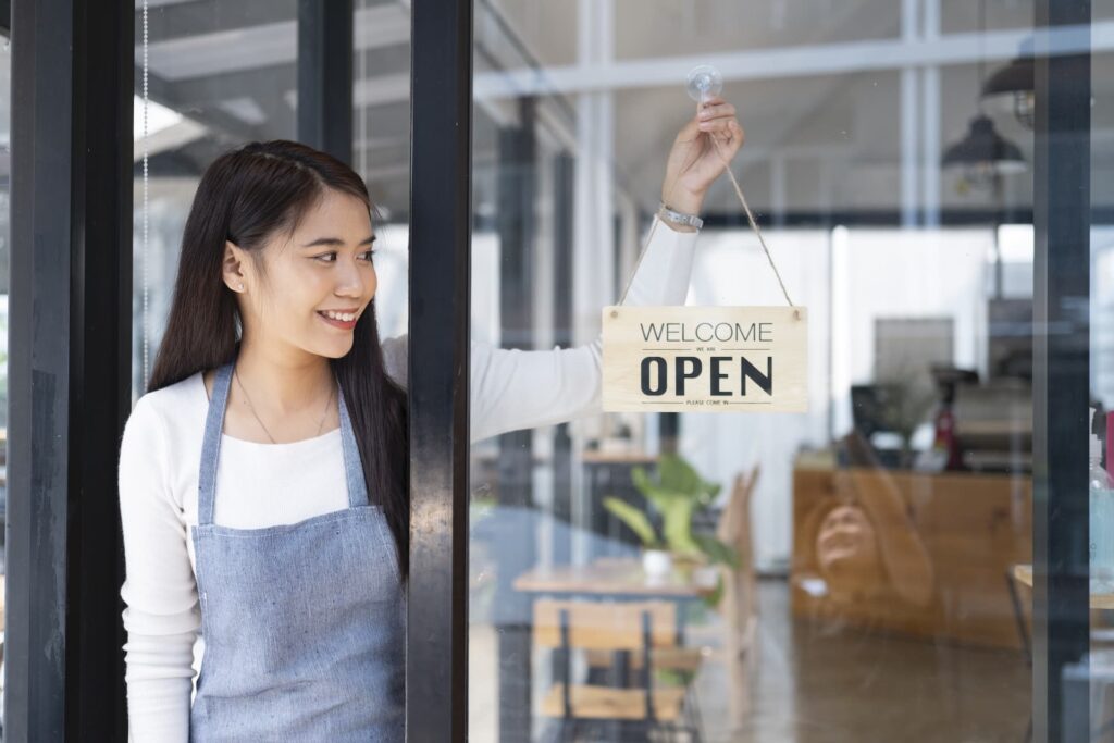 close up of woman hands holding sign now we are 2021 09 03 01 30 29 utc | Web Design & SEO by Douglas Smolens | Douglas Smolens Web Design & SEO